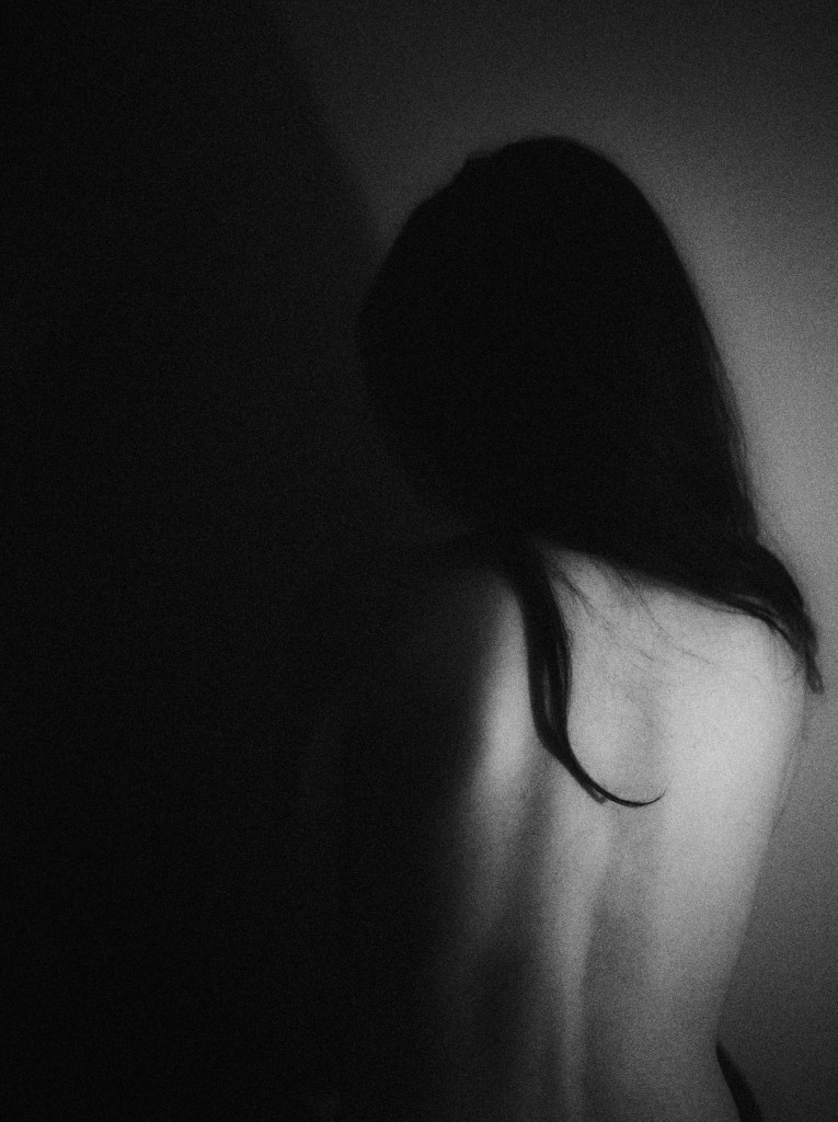 self portrait with big contrast in light and shadow